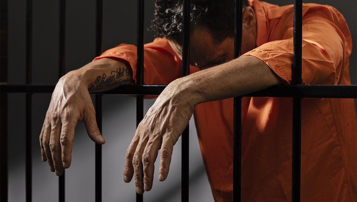 Weed in Kansas: Cannabis Legal Status Guide: A man behind bars